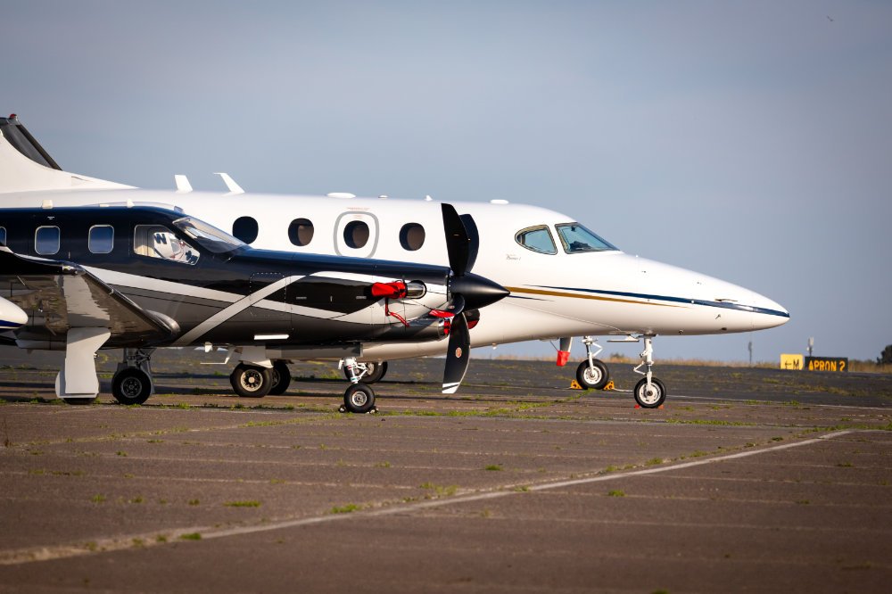 Two private planes on tarmac